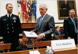  ?? CHIP SOMODEVILL­A / GETTY IMAGES ?? The Pentagon ForceProte­ction Agency on Monday detecteda suspicious substance on envelopes addressed to Defense Secretary Jim Mattis (center) and Chief of Naval Operations Adm. John Richardson.