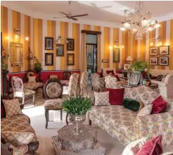  ??  ?? The palace’s interiors are reminiscen­t of the Art Deco era; (top) the great grandson of Joraver Singhji, Paranjayad­itya, and his wife Mandakini live at Shri Joraver Vilas now.