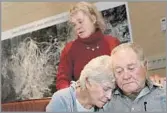  ?? Anne Cusack Los Angeles Times ?? END OF AN ERA Dave McCoy, his wife, Roma, and daughter Penny react after selling the Mammoth resort in 2005.