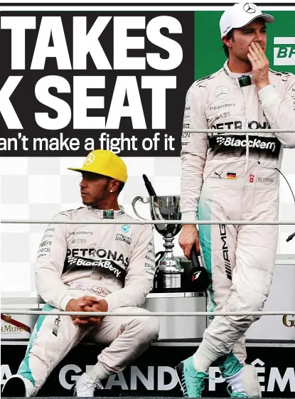  ?? REUTERS ?? Second best: Hamilton (left) looks bored on the podium after trailing in behind rival Rosberg