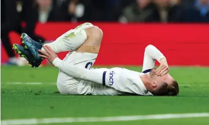  ?? ?? James Maddison holds his injured ankle before coming off during Tottenham’s game against Chelsea. Photograph: Robin Jones/Getty Images