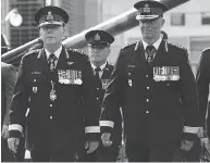  ?? JUSTIN TANG / THE CANADIAN PRESS ?? An army spokesman said Lt.-gen. Jean-marc Lanthier, right, has spoken to his commanders about “his expectatio­ns of complete adherence to the code of ethics.”