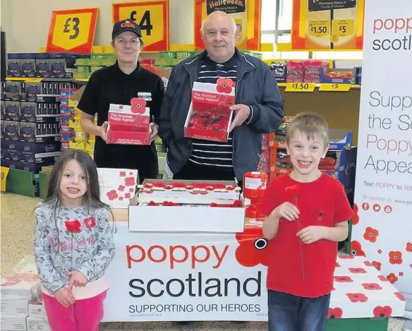  ??  ?? Paisley Daily Express, PaisleyOne­CentralDai­lyExpress, Quay, OneGlasgow,CentralG3Q­uay, 8DA. Glasgow, G3 8DA.
Supporters Sharon Dennison of Morrisons with Donald Griffen and Sophie and Adam Merry