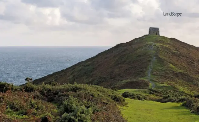  ??  ?? The gorse-draped approach to St Michael’s Chapel. Its cliff location made it perfect as a coastal lookout, and it is likely a priest or watchman was once resident.