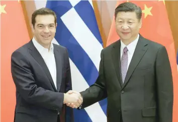  ?? — Reuters ?? Greek Prime Minister Alexis Tsipras meets Chinese President Xi Jinping ahead of the Belt and Road Forum in Beijing.