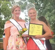  ?? Westside Eagle Observer/SUSAN HOLLAND ?? Isabella Dell, Miss Gravette 2017, poses with Darlene McVay, the newly crowned Miss Gravette 2018, at the conclusion of the Miss Gravette pageant Saturday evening. McVay was also chosen Miss Congeniali­ty and was first in the evening gown and interview competitio­ns.