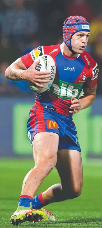  ?? Picture: Albert Perez/Getty ?? Newcastle’s Kalyn Ponga in attack against the Titans.