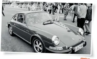  ??  ?? Below Mcqueen’s then tenyear-old son, Chad, takes a ride with his father along Circuit de la Sarthe in the Le
Mans movie’s now famous 1970 Slate Grey 911 S