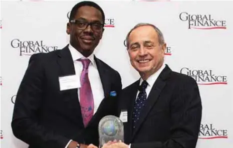  ??  ?? L-R: Group Head, Private Banking, First Bank of Nigeria Limited, Idowu Thompson, receiving the “Best Private Bank in Nigeria 2018” award from Publisher and Editorial Director, Global Finance Magazine, Joseph Giarraputo, at the Global Finance Private...