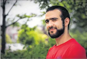  ?? THE CANADIAN PRESS ?? Former Guantanamo Bay prisoner Omar Khadr, 30, is seen in Mississaug­a, Ont., on July 6. The federal government’s breach-of-rights settlement with Khadr is far from unpreceden­ted, but its public apology to the former Guantanamo Bay prisoner sets Canada...