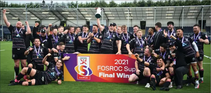  ?? ?? Ayrshire Bulls celebrate their Super6 title win on Sunday after a season in which they consistent­ly raised their game in the one-off matches where it mattered most