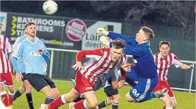  ??  ?? Deveronval­e keeper Grant Pennet clears this Formartine attack