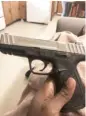  ?? ATF ?? Federal authoritie­s allege that Darius Murphy used this Smith and Wesson pistol to kill Donald Holmes and Diane Taylor.