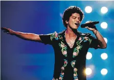  ??  ?? Bruno Mars earned six Grammy nods on Tuesday.