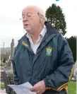  ??  ?? John Arnold (Bride Rovers) delivers a self-penned rendition to salute Scór founder Derry Gowen at Kilcrumper Cemetery.