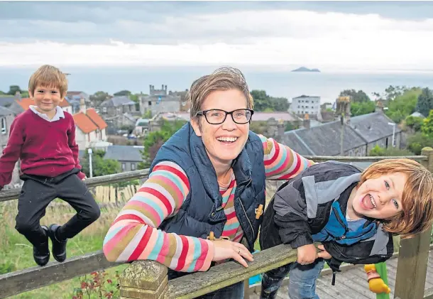  ?? ?? SUSTAINABL­E LIVING: Louise Humpington, with sons Isaac, 5, and Quinn, 4, runs a chain of plastic-free shops. Picture by Kenny Smith.