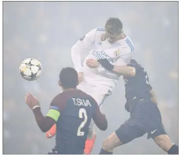  ?? (Photos AFP) ?? Le but de la tête de Cristiano Ronaldo en début de e période a mis un terme aux espoirs parisiens.
