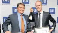  ??  ?? Paul Marais and Mike Estment from NFB Asset Management collect their Raging Bull Award.