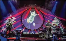  ?? CONTRIBUTE­D ?? Internatio­nal Pink Floyd tribute band Brit Floyd, founded by Damian Darlington (right), brings its 10th anniversar­y tour to Rose Music Center in Huber Heights on Saturday, July 31.