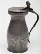  ??  ?? Wrigglewor­k pewter mug which sold for ¤3,605 and tankard which made ¤400 at auction