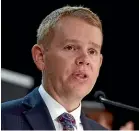  ?? ROBERT KITCHIN/STUFF ?? Covid response minister Chris Hipkins is removing the requiremen­t for permanent residents to be vaccinated to travel to New Zealand.