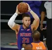  ?? ASSOCIATED PRESS FILE PHOTO ?? Detroit Pistons forward Blake Griffin (23) looks to pass over Phoenix Suns guard Chris Paul (3) during a Feb. 5 game in Phoenix.