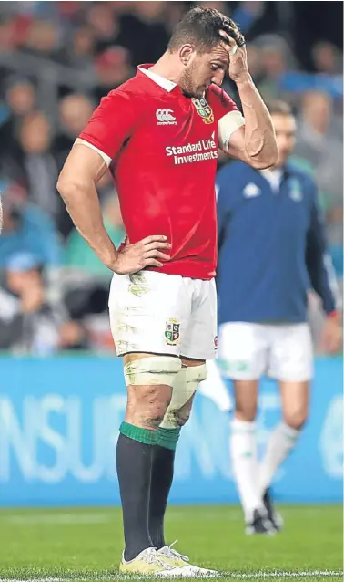  ??  ?? Sam Warburton tries to come to terms with the Lions defeat in Auckland.