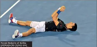  ??  ?? Novak Djokovic of Serbia celebrates his victory over Rafael Nadal of Spain in the men's final match -AFP