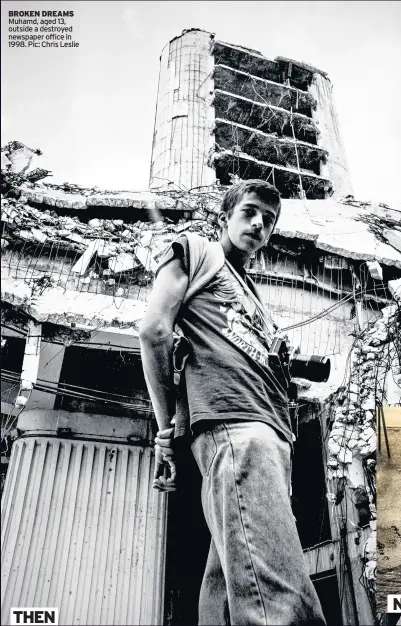  ??  ?? BROKEN DREAMS Muhamd, aged 13, outside a destroyed newspaper office in 1998. Pic: Chris Leslie