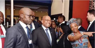  ?? (Photo: GCIS) ?? President Jacob Zuma accompanie­d by Minister of Finance Malusi Gigaba and head of WEF Elsie Kanza at the World Economic Forum on Africa meeting in Durban.