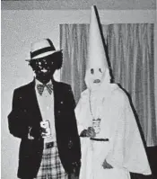 ?? OBTAINED BY THE WASHINGTON POST ?? Ralph Northam’s page in a 1984 medical school yearbook shows a person in blackface next to one in a KKK costume.
