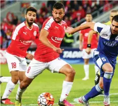  ?? (Danny Maron) ?? HAPOEL BEERSHEBA striker Mohammad Ghadir (center) scored his team’s second goal in last night’s 2-0 victory over Maccabi Tzur Shalom in the State Cup round-of-32.