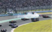  ??  ?? Verstappen and Leclerc got together at the second turn