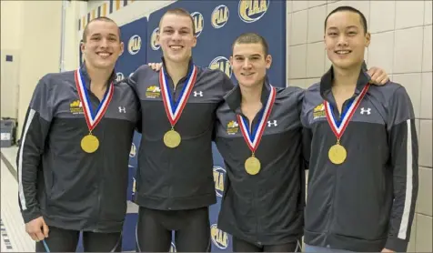  ??  ?? The North Allegheny 400 freestyle relay team of, from left, Jack Wright, Mason Gonzalez, Rick Mihm and Andrew Zhang, broke the U.S. public high school and National Federation of High Schools records last season en route to a PIAA championsh­ip.