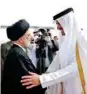  ?? QATAR NEWS AGENCY ?? Iranian President Seyyed Ebrahim Raeisi and Qatari Emir Sheikh Tamim bin Hamad Al Thani shake hands in Doha on February 21, 2022.