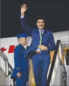  ?? CP PHOTO ?? Prime Minister Justin Trudeau arrives in Stansted, England on Tuesday.