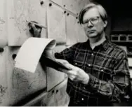  ?? TONY BOCK/TORONTO STAR FILE PHOTO ?? Phillips researches weather trends at Environmen­t Canada in the 1980s.