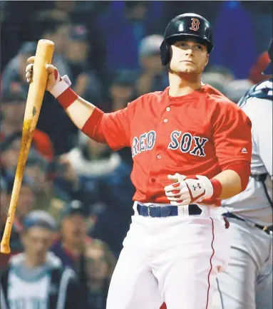  ?? Michael Dwyer / Associated Press ?? Boston’s Andrew Benintendi reacts after striking out to end the game on Friday, a 4-3 loss to Tampa Bay.