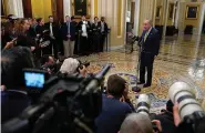  ?? (AP Photo/Susan Walsh) ?? Senate Majority Leader Chuck Schumer, of N.Y., speaks with reporters following a meeting with Ukrainian President Volodymyr Zelenskyy and other senators Tuesday on Capitol Hill in Washington.