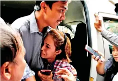  ??  ?? Kyaw and his sister Nyo Nyo Aye hug each other as he arrives at court. — Reuters photo