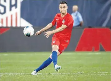  ?? JEFF ROBERSON/AP ?? U.S. defender Aaron Long passes the ball during the second half of a friendly soccer match against Uruguay on Sept. 10, 2019, in St. Louis. The game ended in a 1-1 tie.