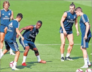  ??  ?? VINICIUS, AYER. El brasileño sufrió en el centro del rondo la calidad de sus compañeros.