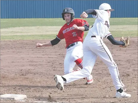  ?? PHOTO BY RICK PECK ?? McDonald County’s Mark Kailbourn slides into third base ahead of a tag by Morrilton’s Carson Collins during the Mustangs’ 5-3 win on March 18 at the Harrison Tournament.