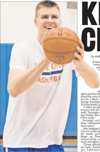  ?? Richard Harbus (2) ?? BRACE YOURSELF: Kristaps Porzingis talks with coach Jeff Hornacek (at right) during practice Friday. The second-year Latvian star wore a brace on his aching right knee and did not participat­e fully, but he said he still expects to play Christmas Day.