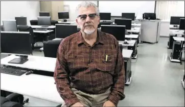  ?? The Sentinel-Record/Richard Rasmussen ?? ON THE JOB: The success of National Park College’s adult education program at the Garland County Detention Center allowed it to hire Wells Autrey as a full-time teacher. He started July 1 after working as a GED instructor for the Arkansas Department of...