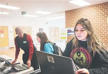  ??  ?? Chopticon High School student Rebecca Rhodes, 15, makes an electronic pledge for the national ‘Stop Bullying-Speak up Campaign’ on Monday, Apr 7 in Morganza. A 16-year-old autistic boy who attends the school was allegedly bullied by two female...