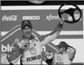  ?? Associated Press ?? WINNER
Joey Logano celebrates in Victory Lane after winning the first of the two NASCAR Daytona 500 qualifying races at Daytona Internatio­nal Speedway on Thursday in Daytona Beach, Florida.