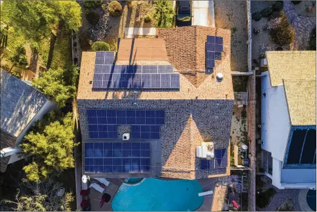  ?? JOHN BRECHER FOR THE WASHINGTON POST 2019 ?? Adequate sunlight is key. Other roadblocks include insufficie­nt roof space, a complex roof design, or the age and slope of your roof. Typically, solar panels perform best on south-facing roofs with a slope between 15 and 40 degrees.