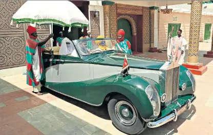  ??  ?? Global views: Emir of Kano’s Rollsroyce (2012) from George Osodi’s collection, Nigerian Monarchs; below left, sculptures from Haegue Yang’s The Intermedia­tes on show