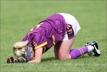  ??  ?? Dejection for Wexford’s Kellie Kearney after the final whistle.